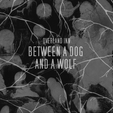 OVERLAND INN - BETWEEN A DOG AND A WOLF